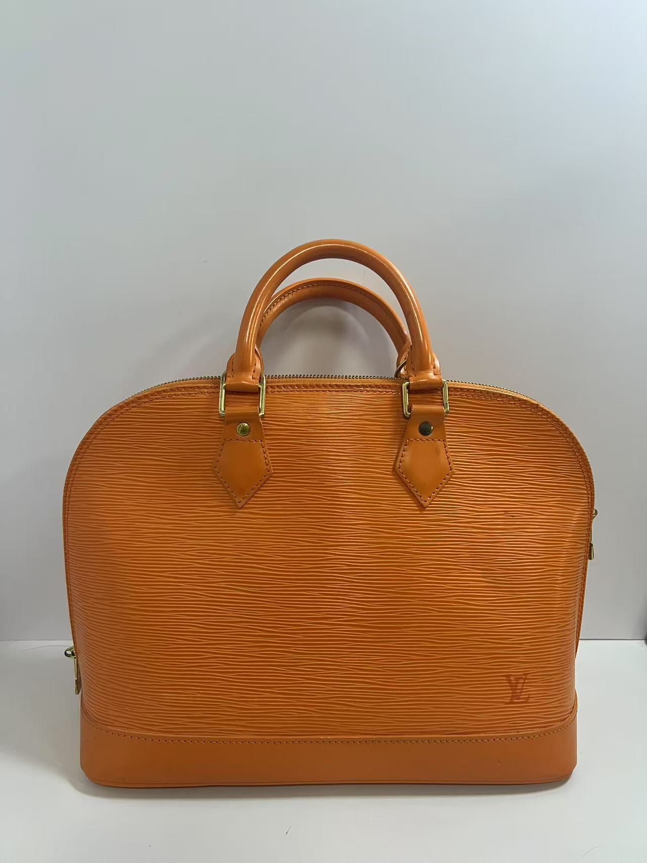Louis Vuitton Alma PM Mandarin Epi Leather Handbag