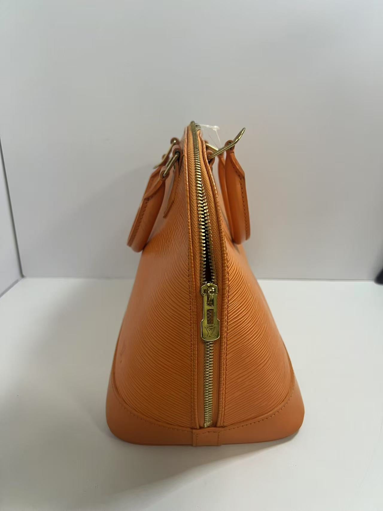 Louis Vuitton Alma PM Mandarin Epi Leather Handbag
