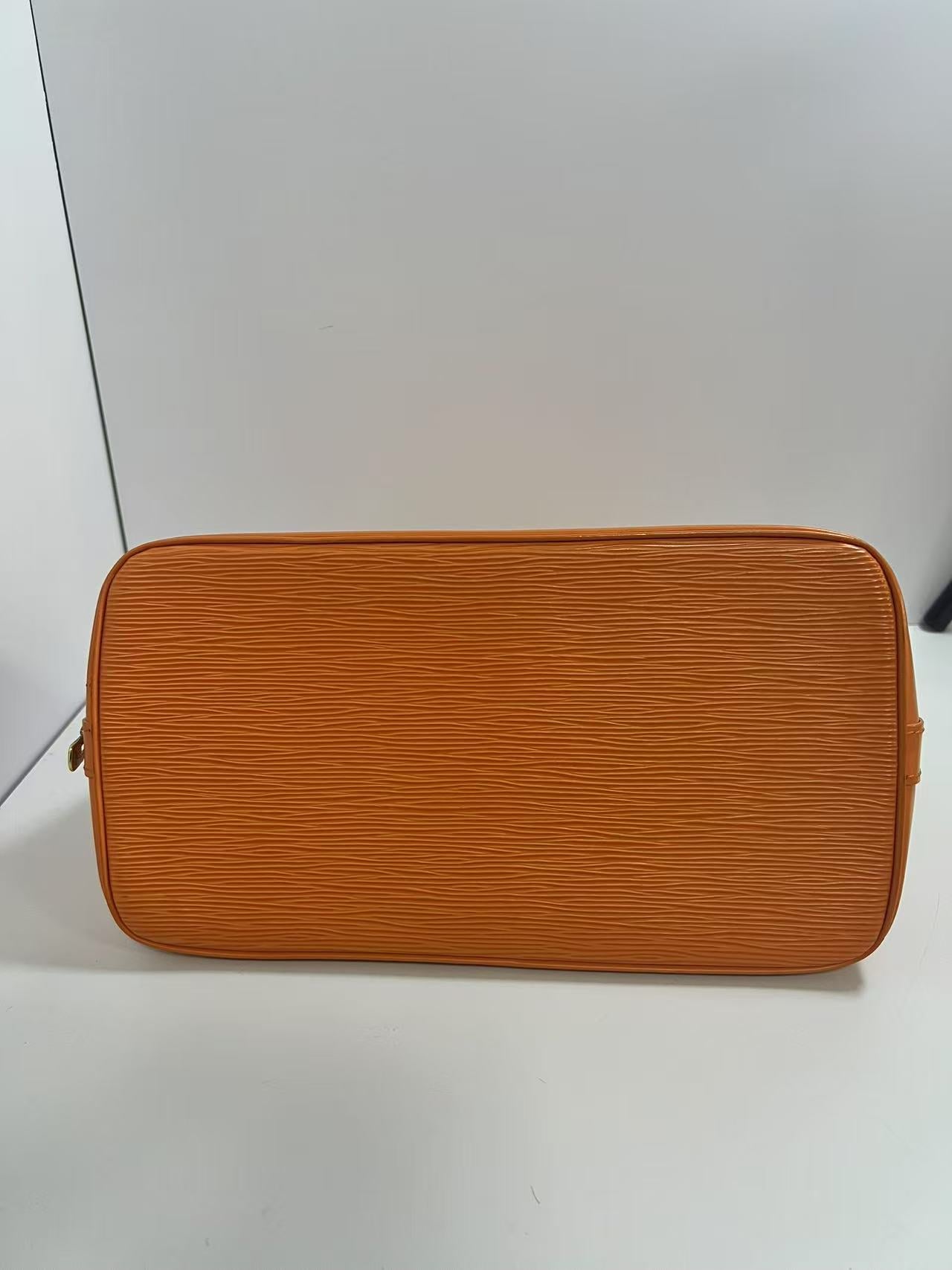Louis Vuitton Alma PM Mandarin Epi Leather Handbag