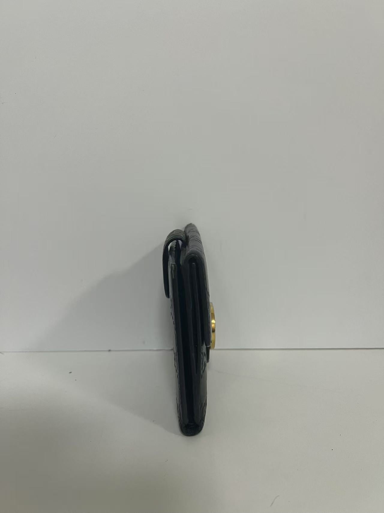 Gucci Guccissima Black Embossed Leather Interlocking G Snap Wallet