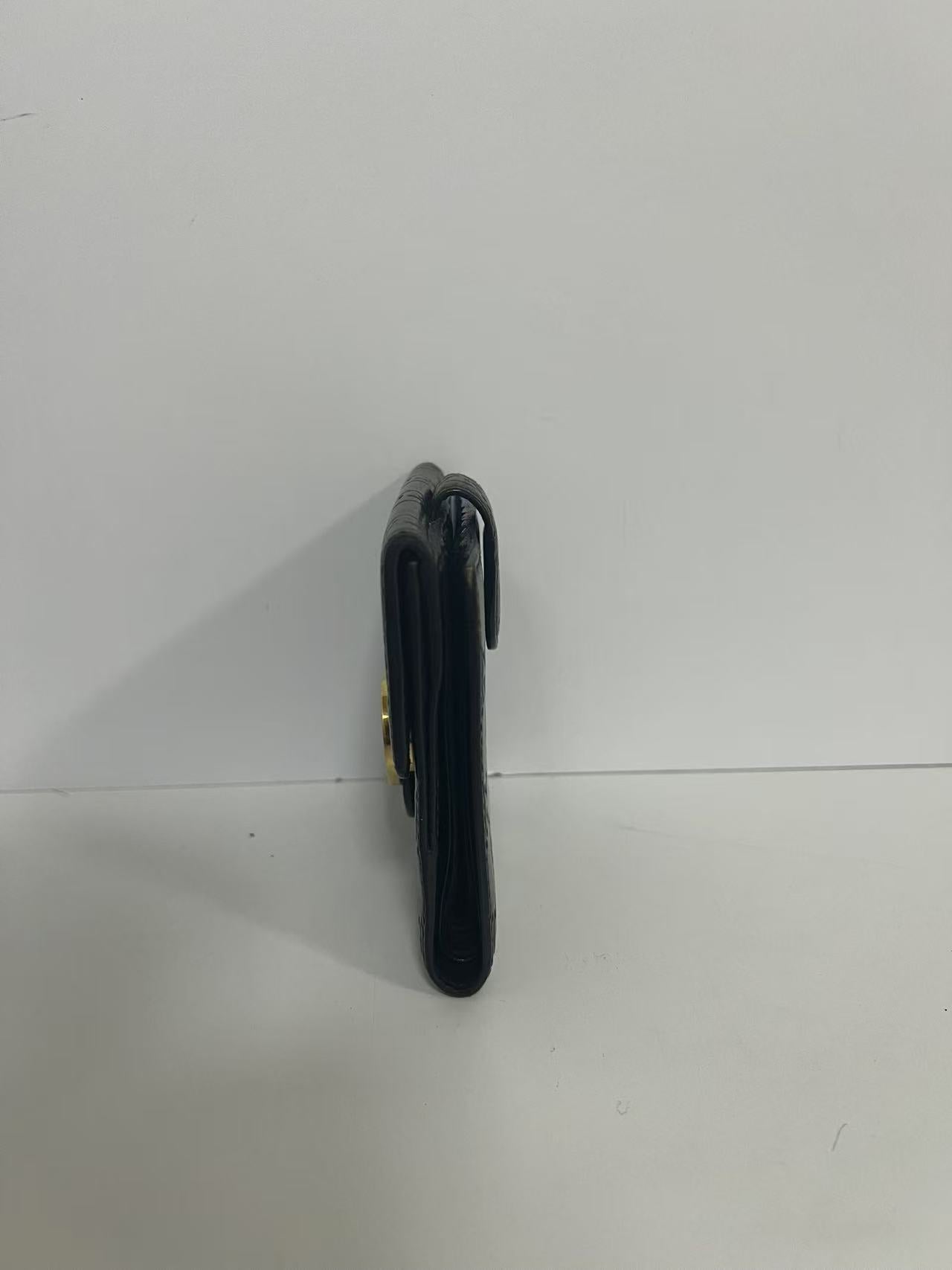 Gucci Guccissima Black Embossed Leather Interlocking G Snap Wallet