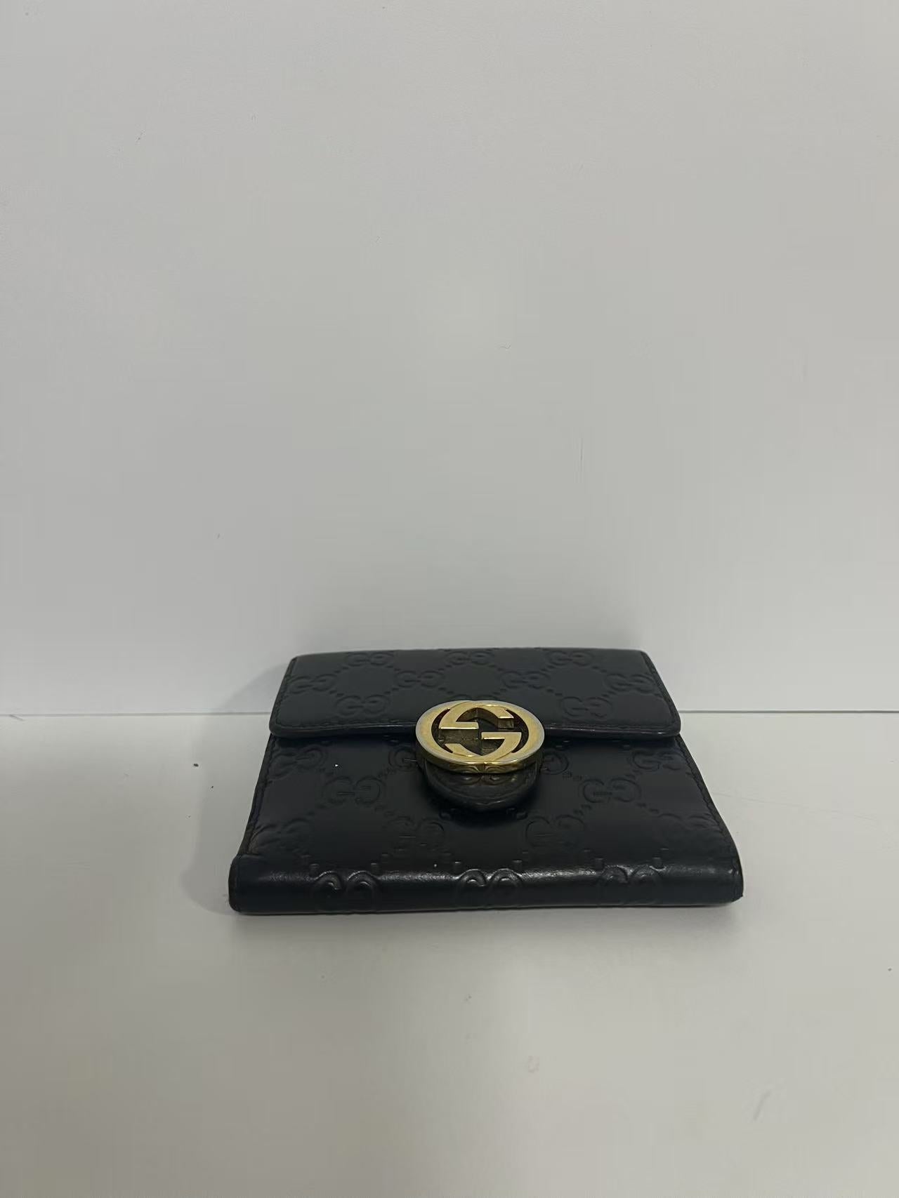 Gucci Guccissima Black Embossed Leather Interlocking G Snap Wallet