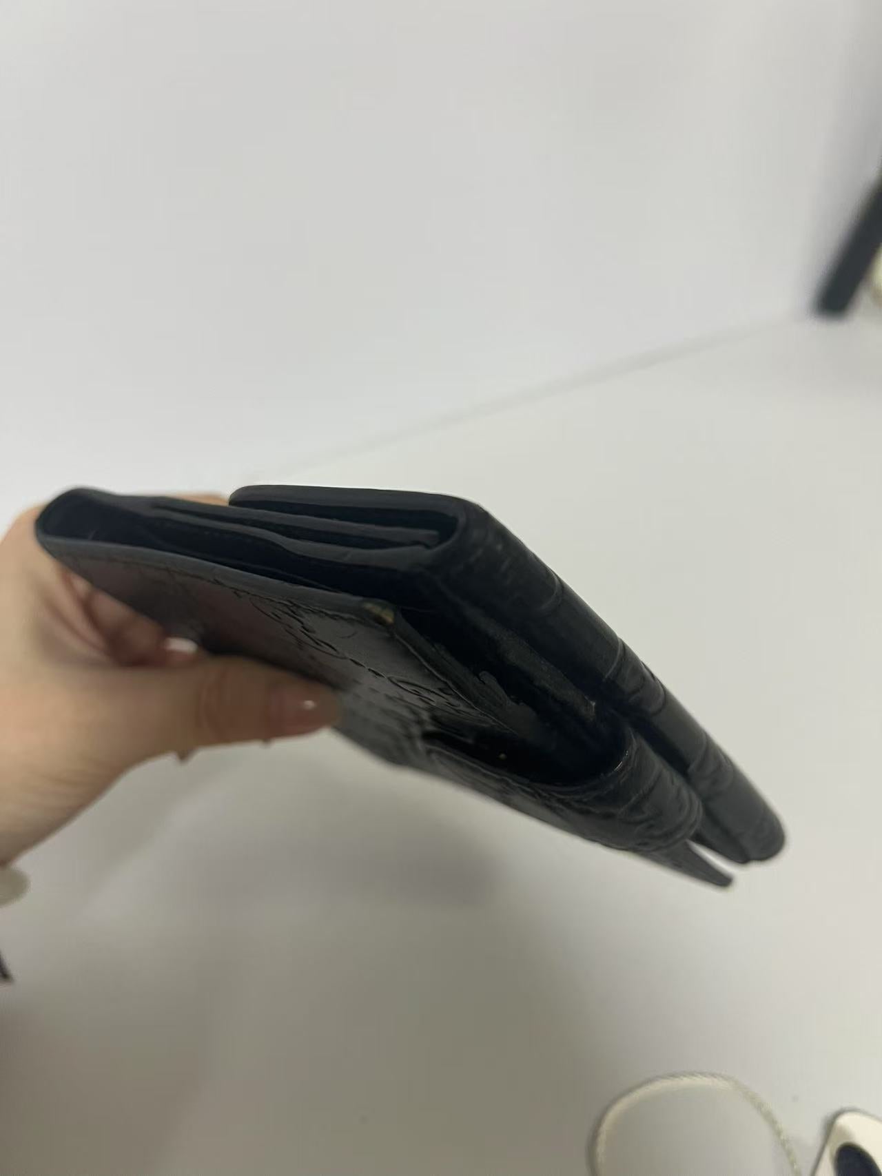 Gucci Guccissima Black Embossed Leather Interlocking G Snap Wallet