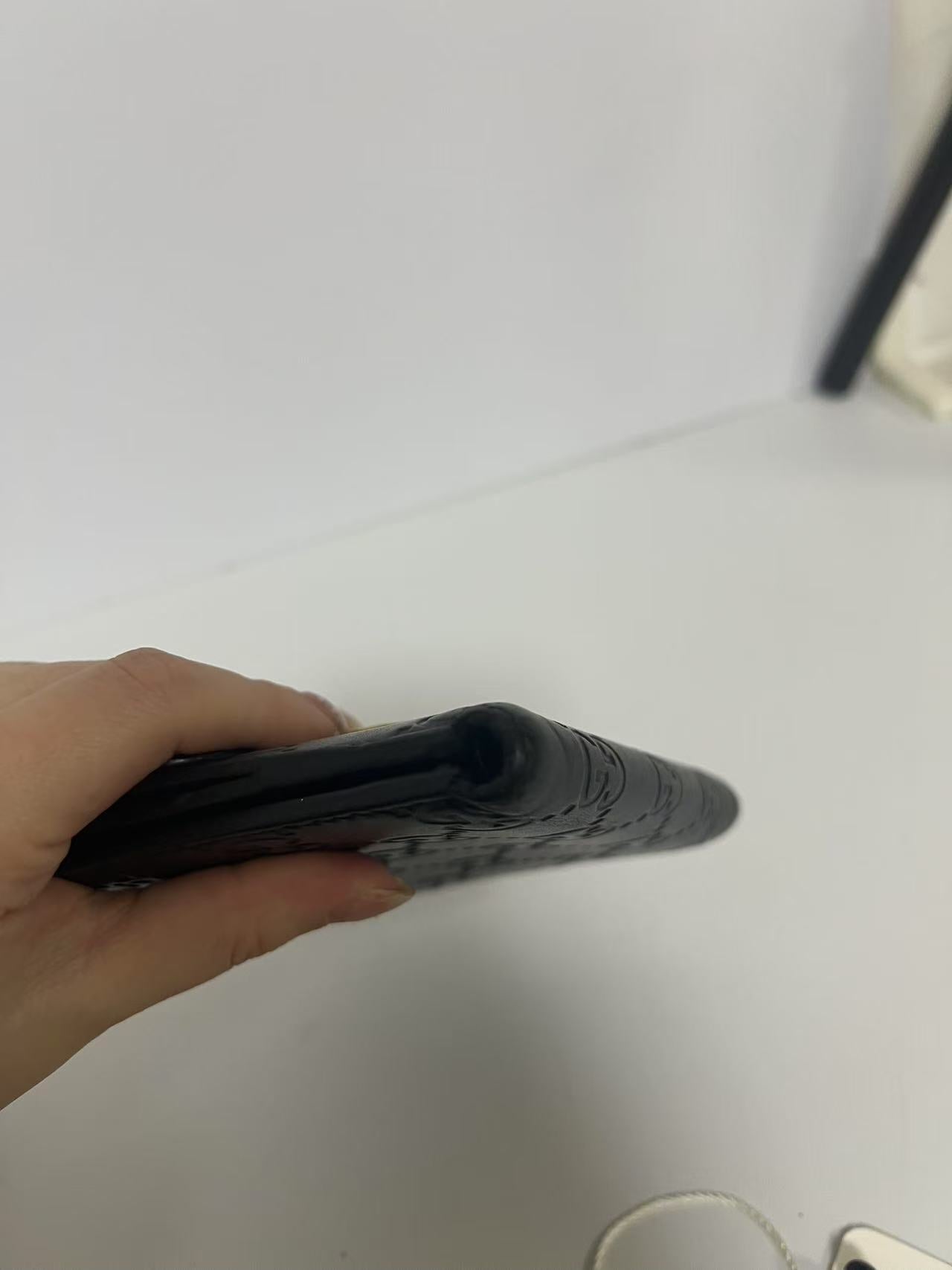 Gucci Guccissima Black Embossed Leather Interlocking G Snap Wallet