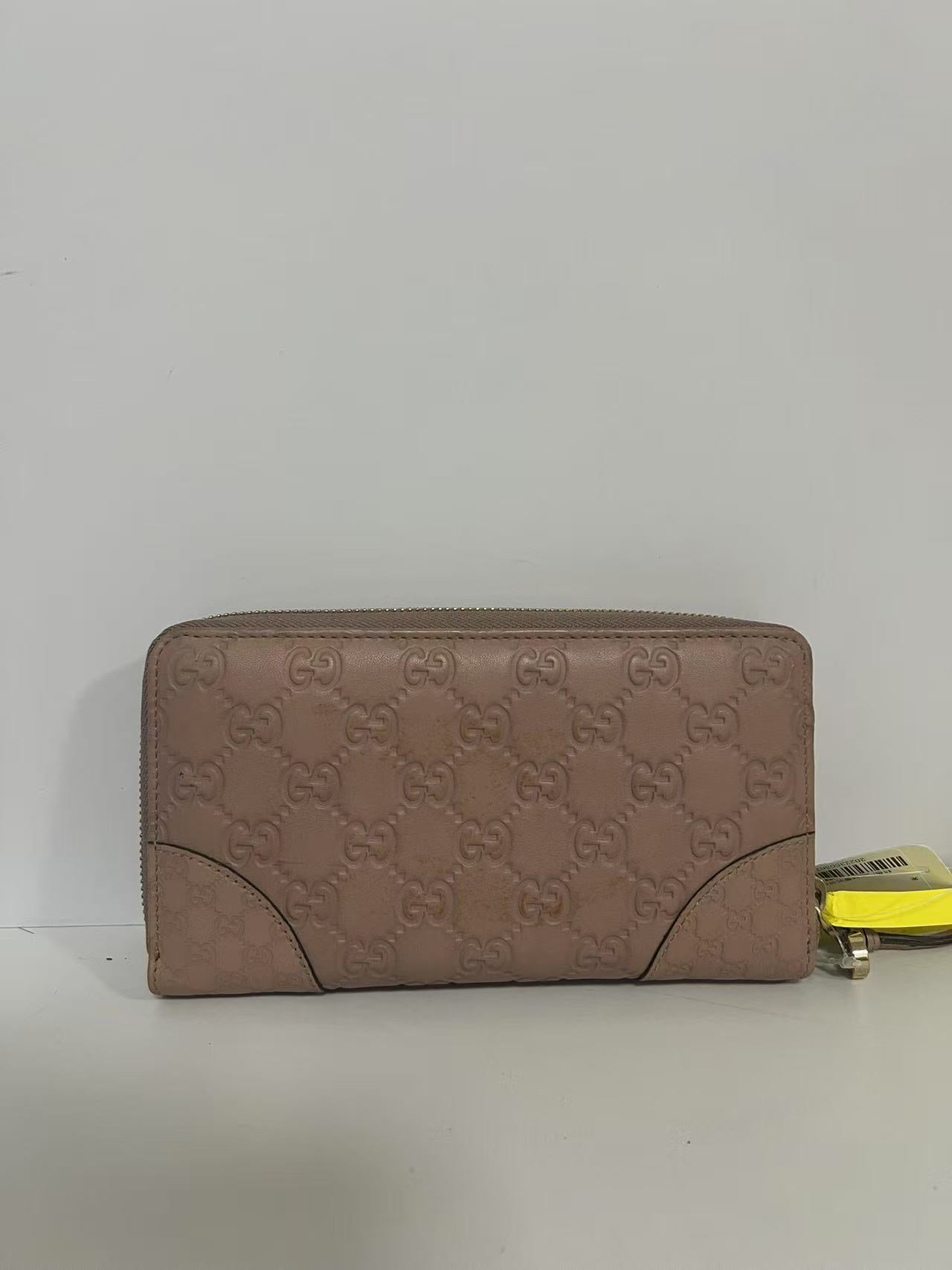 Gucci Guccissima Dusty Pink Embossed Leather Zip-Around Wallet
