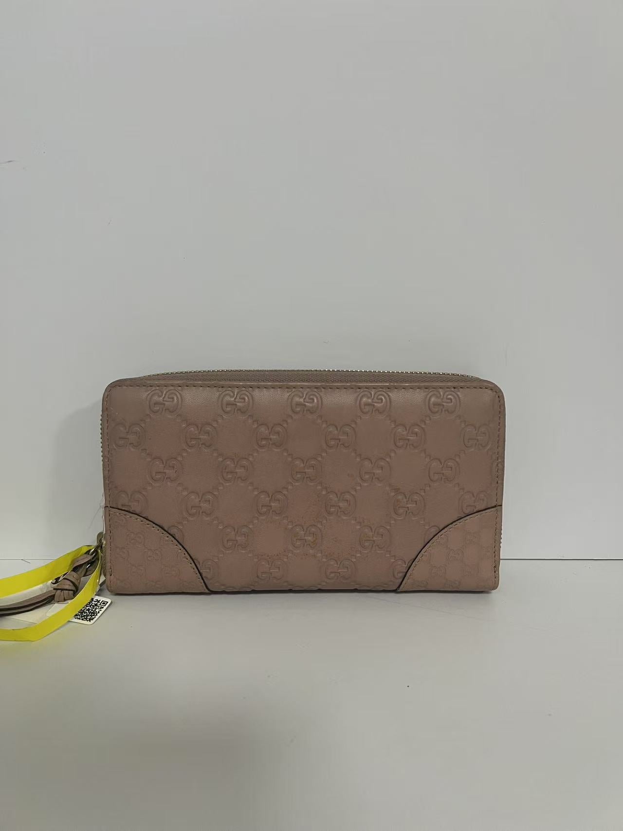 Gucci Guccissima Dusty Pink Embossed Leather Zip-Around Wallet