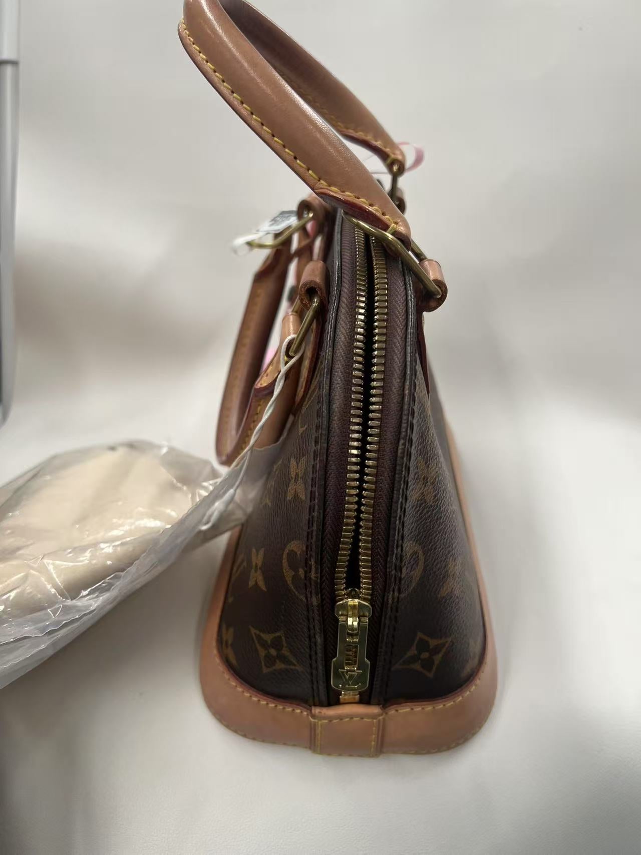 Louis Vuitton Alma BB Monogram Canvas Satchel Bag