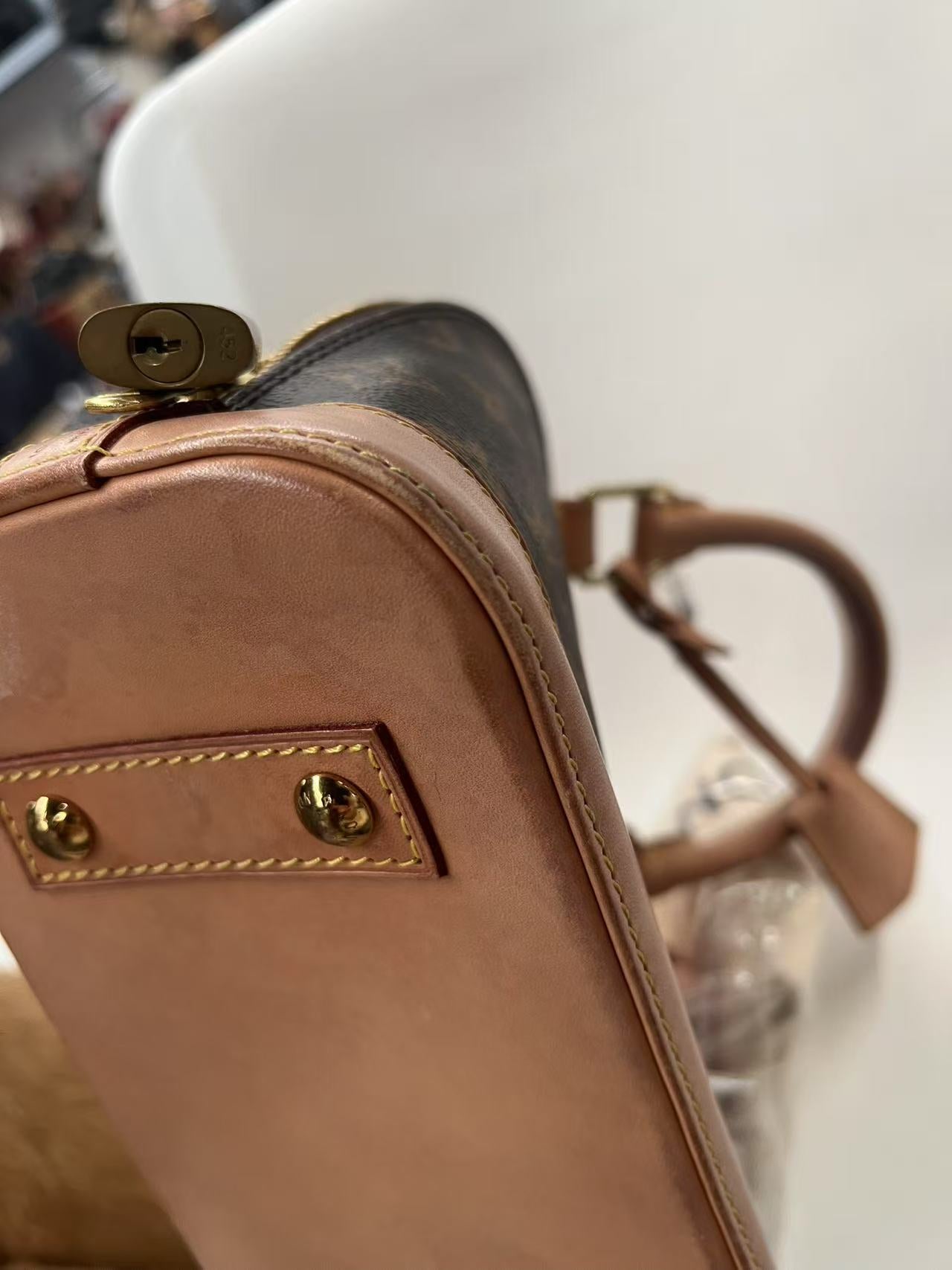 Louis Vuitton Alma BB Monogram Canvas Satchel Bag