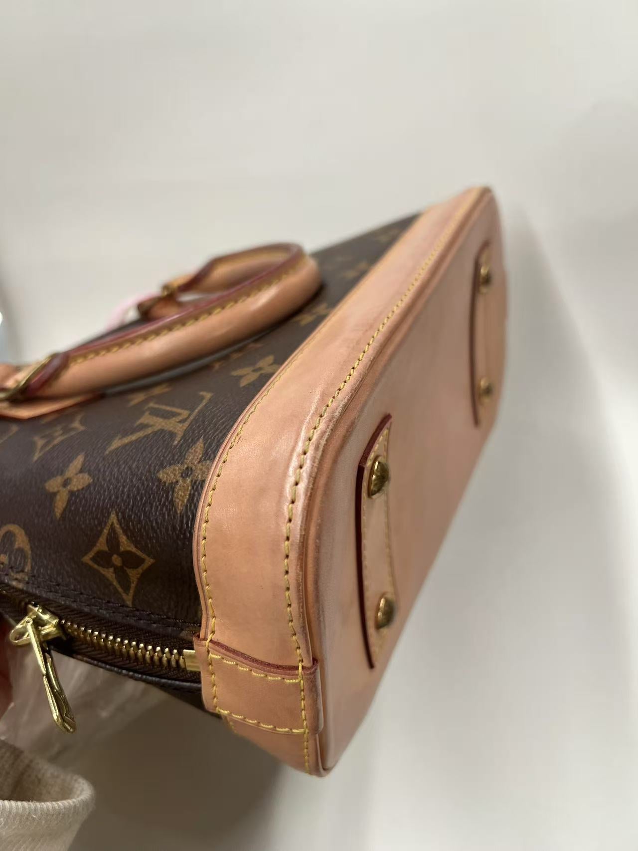 Louis Vuitton Alma BB Monogram Canvas Satchel Bag