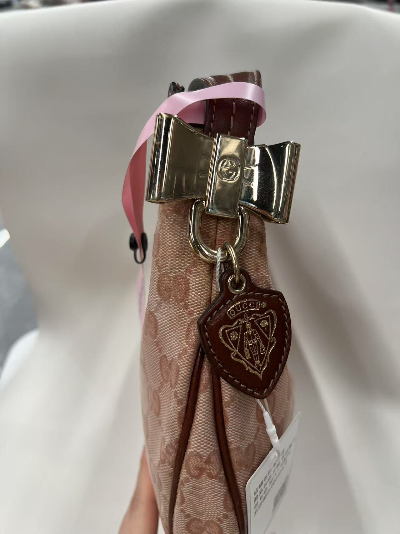 Gucci GG Canvas Pink Crescent Hobo Bag with Bow Charm