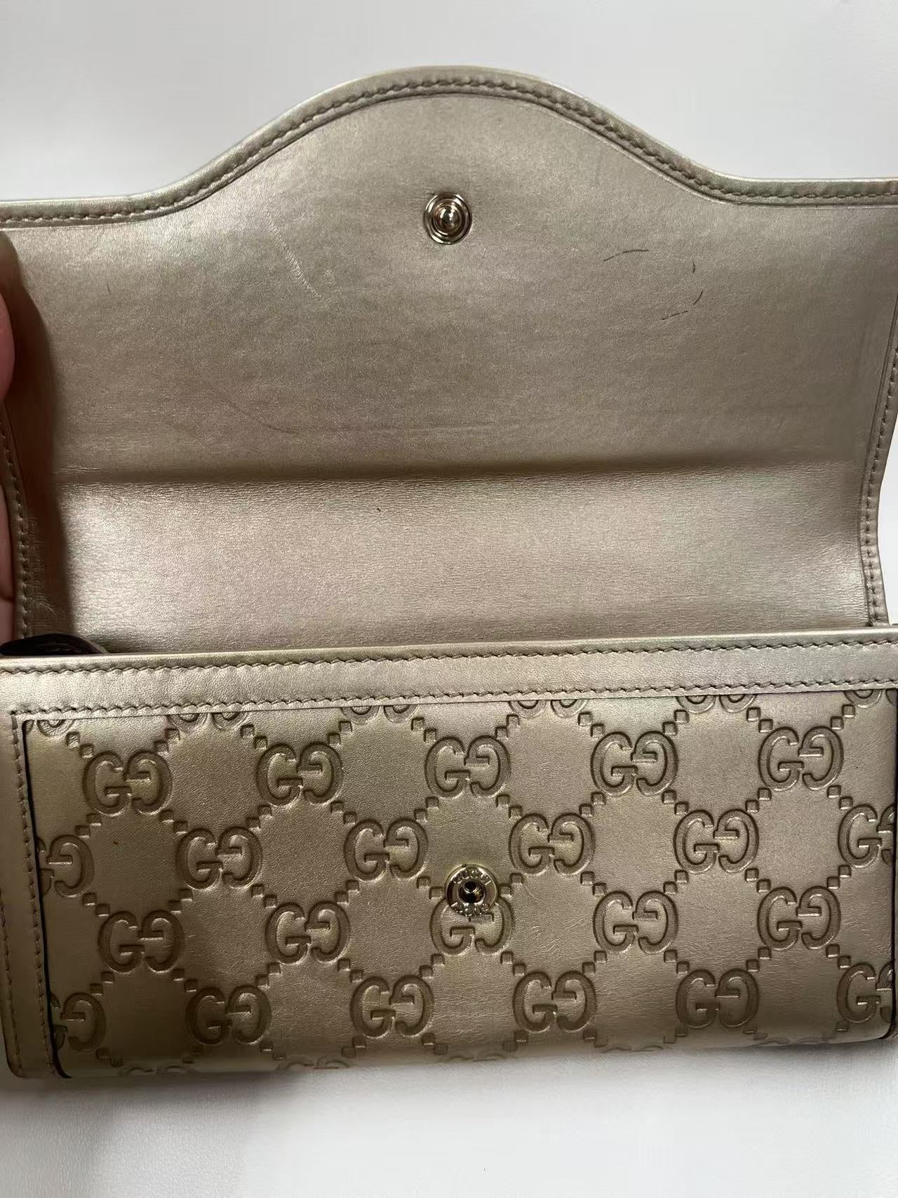Gucci GG Signature Leather Continental Wallet